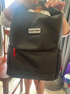 Hunter Black Roll-Top Backpack with Red Zip Pull